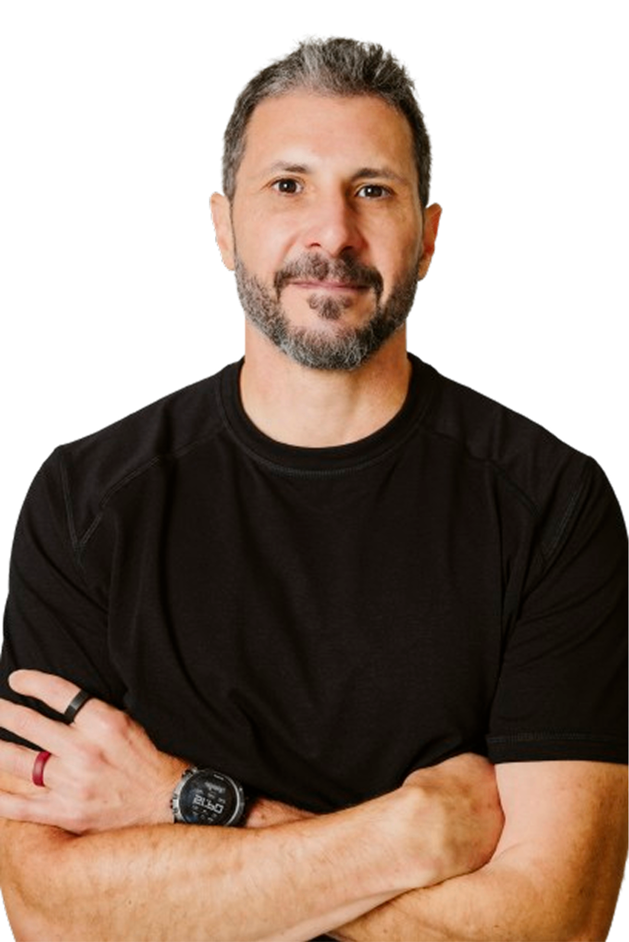 Eric Malzone studio portrait, arms crossed, black t-shirt