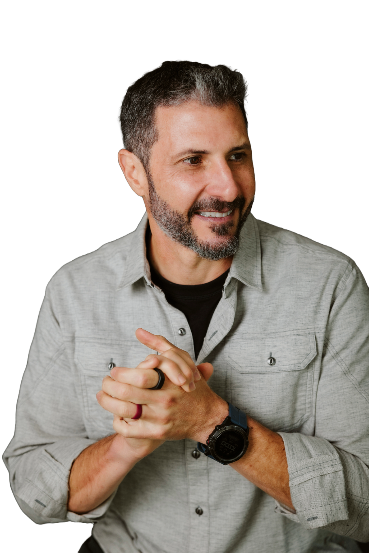 Eric Malzone studio portrait, mid-gesture in conversation